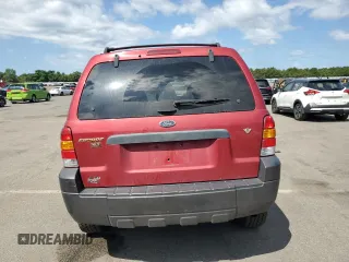 2006 Ford Escape XLT z VIN 1FMCU93136KA12761, wystawiony jako Copart lot #65526955 z przebiegiem 142 075 mil mil oraz Szkoda całkowita • Salvage title. Historia ofert i sprzedaży dostępna na DreamBid. Obrazek 6.
