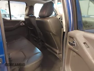 2015 Nissan Frontier SV with VIN 1N6AD0EV4FN709892, listed as a IAAI auction lot 42473594 with 153,103 mi miles and . Bid and sale history available at DreamBid. Image 8.
