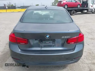 2018 BMW 3 Series 330i with VIN WBA8B9C56JEE80803, listed as a IAAI auction lot 42015173 with 98,124 mi miles and . Bid and sale history available at DreamBid. Image 16.