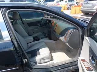 2004 Cadillac CTS with VIN 1G6DM577040128494, listed as a IAAI auction lot 42111727 with 102,142 mi miles. Bid and sale history available at carsss.com. Image 5.