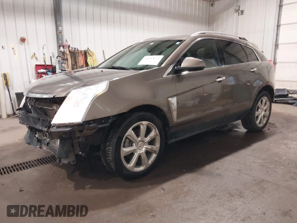 2014 Cadillac SRX Performance Collection z VIN 3GYFNFE38ES578066, wystawiony jako IAAI lot #42153023 z przebiegiem 134 009 mil mil oraz . Historia ofert i sprzedaży dostępna na DreamBid. Obrazek 2.