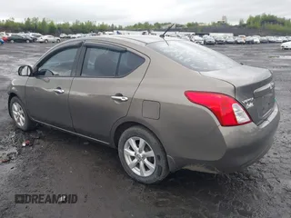 2012 Nissan Versa SV with VIN 3N1CN7AP3CL860116, listed as a IAAI auction lot 42329920 with 105,447 mi miles and . Bid and sale history available at DreamBid. Image 3.