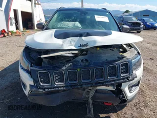 2021 Jeep Compass Trailhawk with VIN 3C4NJDDB0MT551172, listed as a IAAI auction lot 40155947 with 50,794 mi miles and . Bid and sale history available at DreamBid. Image 12.