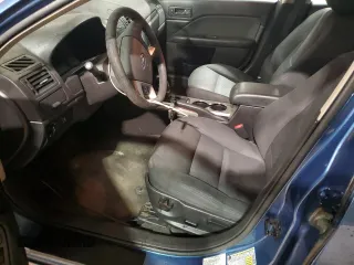 2010 Ford Fusion SE with VIN 3FAHP0HA5AR297821, listed as a Copart auction lot 47209345 with 153,668 mi miles and Salvage Title. Bid and sale history available at DreamBid. Image 7.
