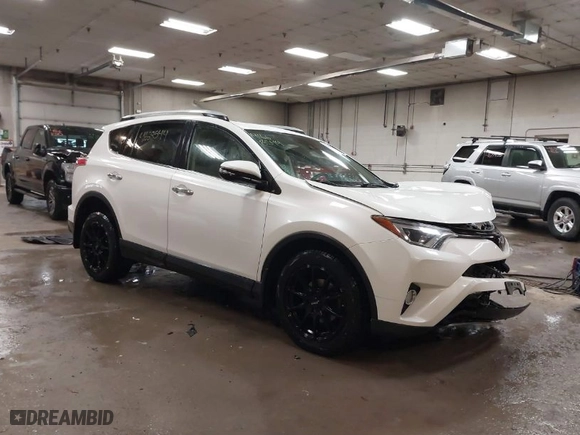 2018 Toyota RAV4 Limited with VIN JTMDFREV6JJ186499, listed as a IAAI auction lot 41668544 with 130,336 mi miles. Bid and sale history available at carsss.com. Image 1.
