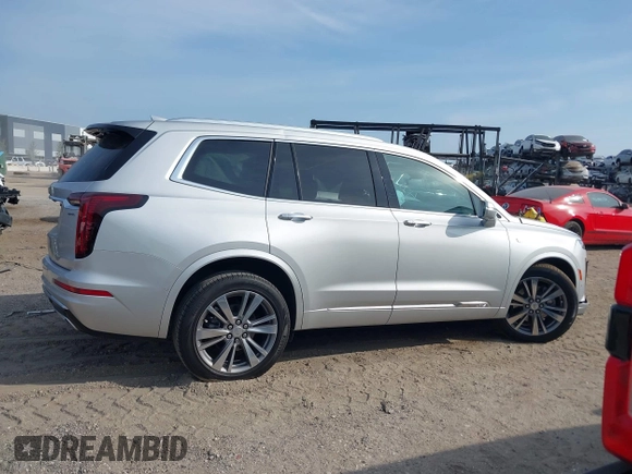 2020 Cadillac XT6 FWD Premium Luxury z VIN 1GYKPCRSXLZ136057, wystawiony jako IAAI lot #42211514 z przebiegiem 32 476 mil mil oraz . Historia ofert i sprzedaży dostępna na DreamBid. Obrazek 13.
