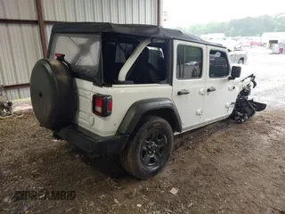 2021 Jeep Wrangler Unlimited Willys with VIN 1C4HJXDN4MW790999, listed as a IAAI auction lot 42236588 with 53,954 mi miles and . Bid and sale history available at DreamBid. Image 4.