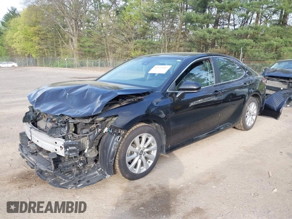 2020 Toyota Camry LE with VIN 4T1C11AK2LU393699, listed as a IAAI auction lot 42123267 with 66,932 mi miles and . Bid and sale history available at carsss.com. Image 20.