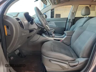 2011 Kia Sportage LX with VIN KNDPBCA22B7017760, listed as a Copart auction lot 60570025 with 118,617 mi miles and Salvage title. Bid and sale history available at DreamBid. Image 7.