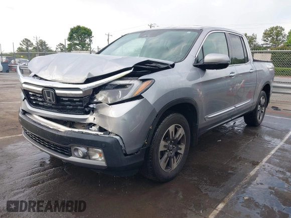 2019 Honda Ridgeline RTL-E with VIN 5FPYK3F72KB026100, listed as a IAAI auction lot 42205910 with 78,359 mi miles and . Bid and sale history available at DreamBid. Image 18.