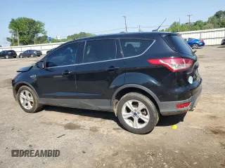 2016 Ford Escape SE with VIN 1FMCU9G93GUA77437, listed as a Copart auction lot 51807905 with 128,261 mi miles and Salvage Title. Bid and sale history available at DreamBid. Image 2.