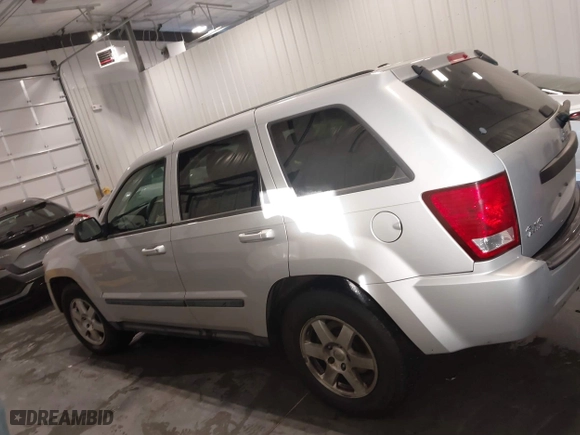 2008 Jeep Grand Cherokee Laredo with VIN 1J8GR48K88C108967, listed as a IAAI auction lot 41306142 with 190,786 mi miles. Bid and sale history available at carsss.com. Image 14.