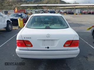 1997 Mercedes-Benz E-Class with VIN WDBJF55F8VJ031834, listed as a IAAI auction lot 41901306 with 1 mi miles. Bid and sale history available at carsss.com. Image 16.