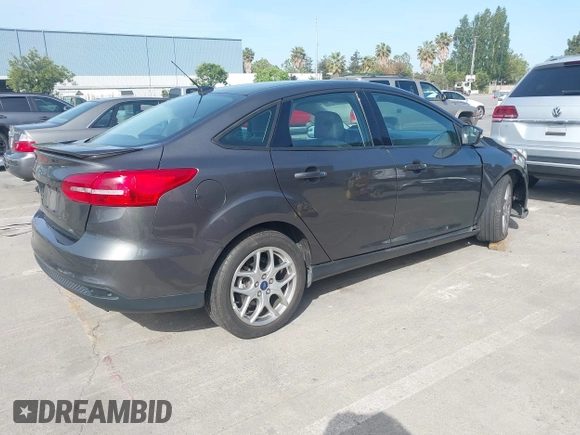 2015 Ford Focus SE with VIN 1FADP3F25FL348929, listed as a IAAI auction lot 42275725 with 99,668 mi miles and . Bid and sale history available at DreamBid. Image 4.