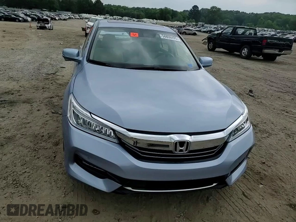 2017 Honda Accord Touring z VIN JHMCR6F75HC002359, wystawiony jako Copart lot #56608495 z przebiegiem 46 273 mil mil oraz Szkoda całkowita • Salvage title. Historia ofert i sprzedaży dostępna na DreamBid. Obrazek 13.