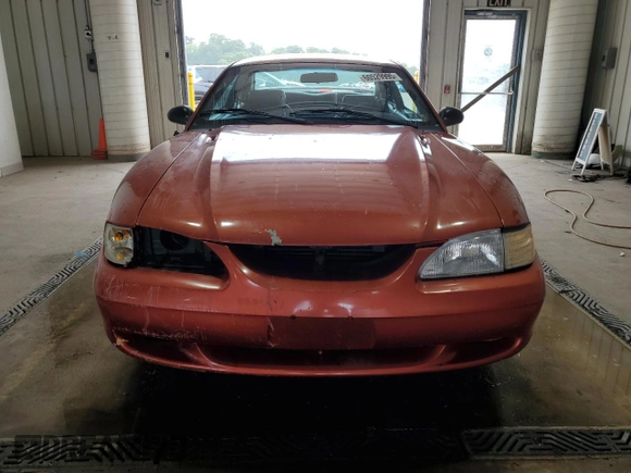 1997 Ford Mustang GT with VIN 1FALP42X3VF130827, listed as a Copart auction lot 60529995 with 112,799 mi miles and Salvage title. Bid and sale history available at DreamBid. Image 5.