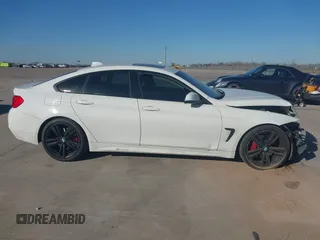 2015 BMW 4 Series 435i with VIN WBA4B1C59FD955497, listed as a IAAI auction lot 41174096 with 101,047 mi miles and . Bid and sale history available at carsss.com. Image 13.
