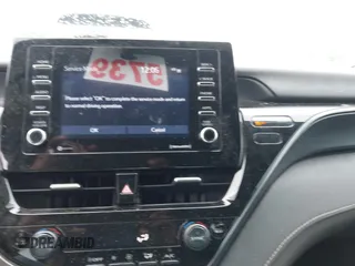 2023 Toyota Camry SE z VIN 4T1G11AK4PU738724, wystawiony jako IAAI lot #42123044 z przebiegiem 58 659 mil mil oraz . Historia ofert i sprzedaży dostępna na DreamBid. Obrazek 19.