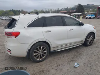 2016 Kia Sorento SX z VIN 5XYPKDA59GG113511, wystawiony jako IAAI lot #41997346 z przebiegiem 140 017 mil mil oraz . Historia ofert i sprzedaży dostępna na DreamBid. Obrazek 4.