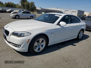 2013 BMW 5 Series 528i with VIN WBAXG5C57DDY37497, listed as a Copart auction lot 64687355 with 94,823 mi miles and Clean title. Bid and sale history available at DreamBid. Image 1.