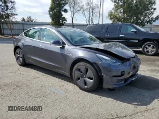 2019 Tesla Model 3 Mid Range with VIN 5YJ3E1EA0KF445185, listed as a Copart auction lot 48630675 with 76,351 mi miles and Salvage Title. Bid and sale history available at carsss.com. Image 4.