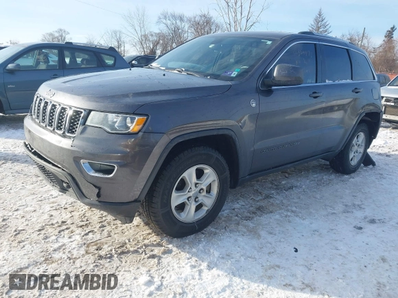 2017 Jeep Grand Cherokee Laredo with VIN 1C4RJFAG7HC876531, listed as a IAAI auction lot 41354471 with 129,056 mi miles. Bid and sale history available at carsss.com. Image 16.