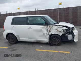 2014 Scion xB with VIN JTLZE4FEXEJ054060, listed as a IAAI auction lot 42096159 with 211,994 mi miles. Bid and sale history available at carsss.com. Image 13.