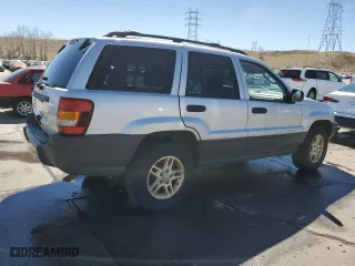 2003 Jeep Grand Cherokee Laredo with VIN 1J4GW48S13C556129, listed as a Copart auction lot 50389215 with 193,934 mi miles and Salvage Title. Bid and sale history available at carsss.com. Image 3.