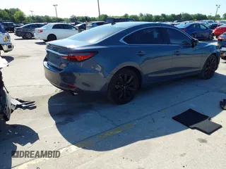 2021 Mazda 6 Carbon Edition with VIN JM1GL1WY4M1619533, listed as a IAAI auction lot 41979213 with 84,783 mi miles and . Bid and sale history available at DreamBid. Image 4.