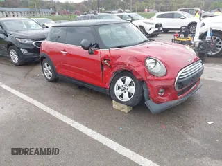 2015 MINI Hardtop with VIN WMWXM5C57F3A57729, listed as a IAAI auction lot 41924772 with 123,040 mi miles and . Bid and sale history available at DreamBid. Image 1.