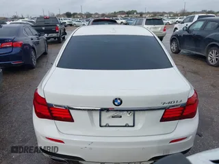 2015 BMW 7 Series 740Li with VIN WBAYE4C54FD947205, listed as a IAAI auction lot 41566291 with 172,729 mi miles and . Bid and sale history available at DreamBid. Image 16.