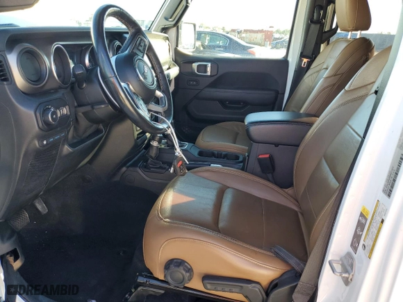 2021 Jeep Wrangler 4xe Unlimited Sahara with VIN 1C4JJXP62MW677073, listed as a Copart auction lot 81990654 with 0 mi miles and Salvage Title. Bid and sale history available at carsss.com. Image 7.