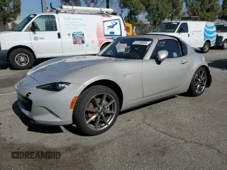 2023 Mazda MX-5 Miata Grand Touring с VIN JM1NDAM73P0561097, выставлен на аукционе Copart как лот 61266885 с пробегом 7 015 миль миль и Списание • Salvage title. История ставок и продаж доступна на DreamBid. Изображение 1.