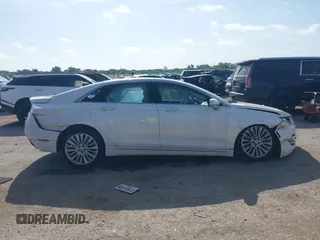 2016 Lincoln MKZ z VIN 3LN6L2G98GR618707, wystawiony jako IAAI lot #42569269 z przebiegiem 159 545 mil mil oraz . Historia ofert i sprzedaży dostępna na DreamBid. Obrazek 14.
