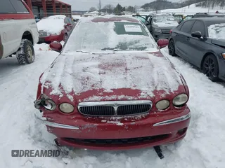 2003 Jaguar X-Type 2.5L Manual z VIN SAJEA51D63XC89273, wystawiony jako IAAI lot #41298544 z przebiegiem 124 400 mil mil oraz . Historia ofert i sprzedaży dostępna na DreamBid. Obrazek 12.