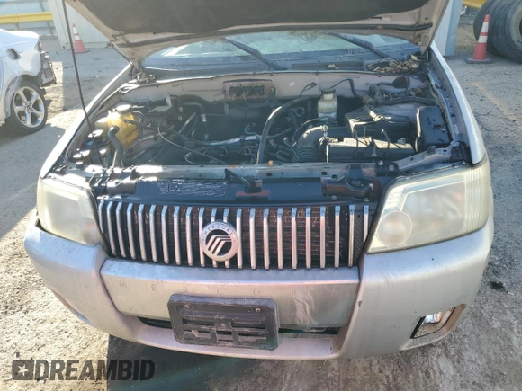 2007 Mercury Mariner Convenience z VIN 4M2YU80Z47KJ11826, wystawiony jako Copart lot #77327954 z przebiegiem 195 320 mil mil oraz Szkody całkowita. Historia ofert i sprzedaży dostępna na DreamBid. Obrazek 13.