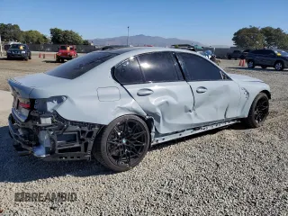2024 BMW M3 Competition with VIN WBS33AY0XRFT58675, listed as a Copart auction lot 81841404 with 2,144 mi miles and Salvage title. Bid and sale history available at DreamBid. Image 3.