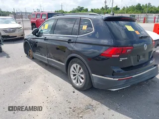 2018 Volkswagen Tiguan SEL with VIN 3VV3B7AX2JM049650, listed as a IAAI auction lot 42169314 with Not Provided miles and . Bid and sale history available at DreamBid. Image 3.