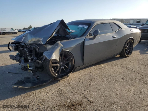 2012 Dodge Challenger SXT with VIN 2C3CDYAG7CH225015, listed as a Copart auction lot 51009695 with 120,915 mi miles and Salvage Title. Bid and sale history available at carsss.com. Image 1.