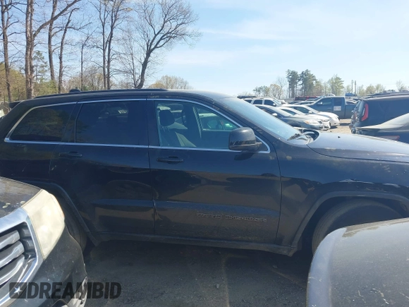 2017 Jeep Grand Cherokee Laredo with VIN 1C4RJFAG5HC793244, listed as a IAAI auction lot 41904575 with 299,722 mi miles. Bid and sale history available at carsss.com. Image 13.
