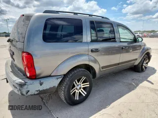 2005 Dodge Durango SXT с VIN 1D4HD38NX5F601092, выставлен на аукционе Copart как лот 63338515 с пробегом 301 984 миль миль и Чистый • Clean title. История ставок и продаж доступна на DreamBid. Изображение 3.