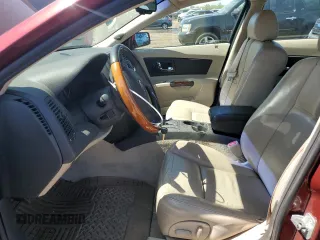 2003 Cadillac CTS z VIN 1G6DM57N830151907, wystawiony jako Copart lot #56451425 z przebiegiem 116 349 mil mil oraz Tytuł czysty. Historia ofert i sprzedaży dostępna na DreamBid. Obrazek 7.