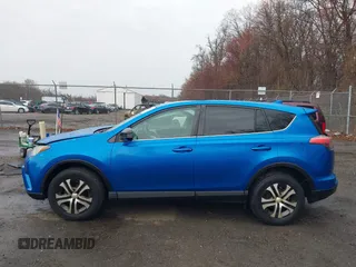 2016 Toyota RAV4 LE with VIN JTMBFREV9GJ100635, listed as a IAAI auction lot 41858669 with 171,644 mi miles. Bid and sale history available at carsss.com. Image 14.