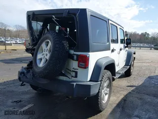 2017 Jeep Wrangler Unlimited Sport with VIN 1C4BJWDG6HL586200, listed as a IAAI auction lot 41723891 with 125,291 mi miles. Bid and sale history available at carsss.com. Image 4.