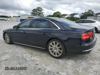 2014 Audi A8 3.0T z VIN WAURGAFD5EN007035, wystawiony jako Copart lot #58578545 z przebiegiem 199 696 mil mil oraz Tytuł czysty. Historia ofert i sprzedaży dostępna na DreamBid. Obrazek 2.