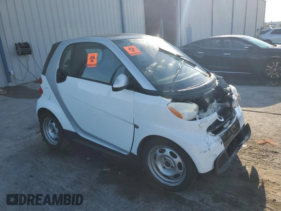 2015 Smart fortwo Passion z VIN WMEEJ3BA6FK797458, wystawiony jako Copart lot #53669365 z przebiegiem 40 695 mil mil oraz Szkody całkowita. Historia ofert i sprzedaży dostępna na DreamBid. Obrazek 4.