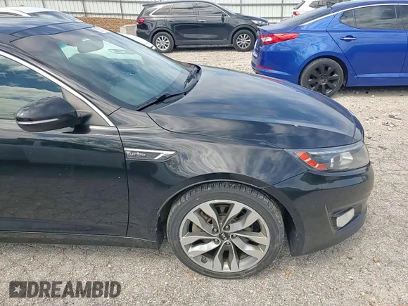 2014 Kia Optima SX Turbo z VIN 5XXGR4A67EG306326, wystawiony jako Copart lot #55883095 z przebiegiem 142 544 mil mil oraz Szkoda całkowita • Salvage title. Historia ofert i sprzedaży dostępna na DreamBid. Obrazek 14.