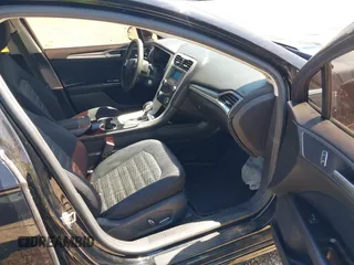 2016 Ford Fusion SE with VIN 3FA6P0HD3GR333466, listed as a IAAI auction lot 42034240 with 184,577 mi miles. Bid and sale history available at carsss.com. Image 5.