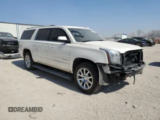 2015 GMC Yukon XL Denali with VIN 1GKS2JKJ3FR585809, listed as a Copart auction lot 48219925 with 191,102 mi miles and Salvage Title. Bid and sale history available at DreamBid. Image 4.
