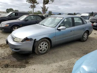 2002 Saturn LS z VIN 1G8JU54F32Y529705, wystawiony jako Copart lot #71895554 z przebiegiem 60 088 mil mil oraz Szkody całkowita. Historia ofert i sprzedaży dostępna na DreamBid. Obrazek 1.
